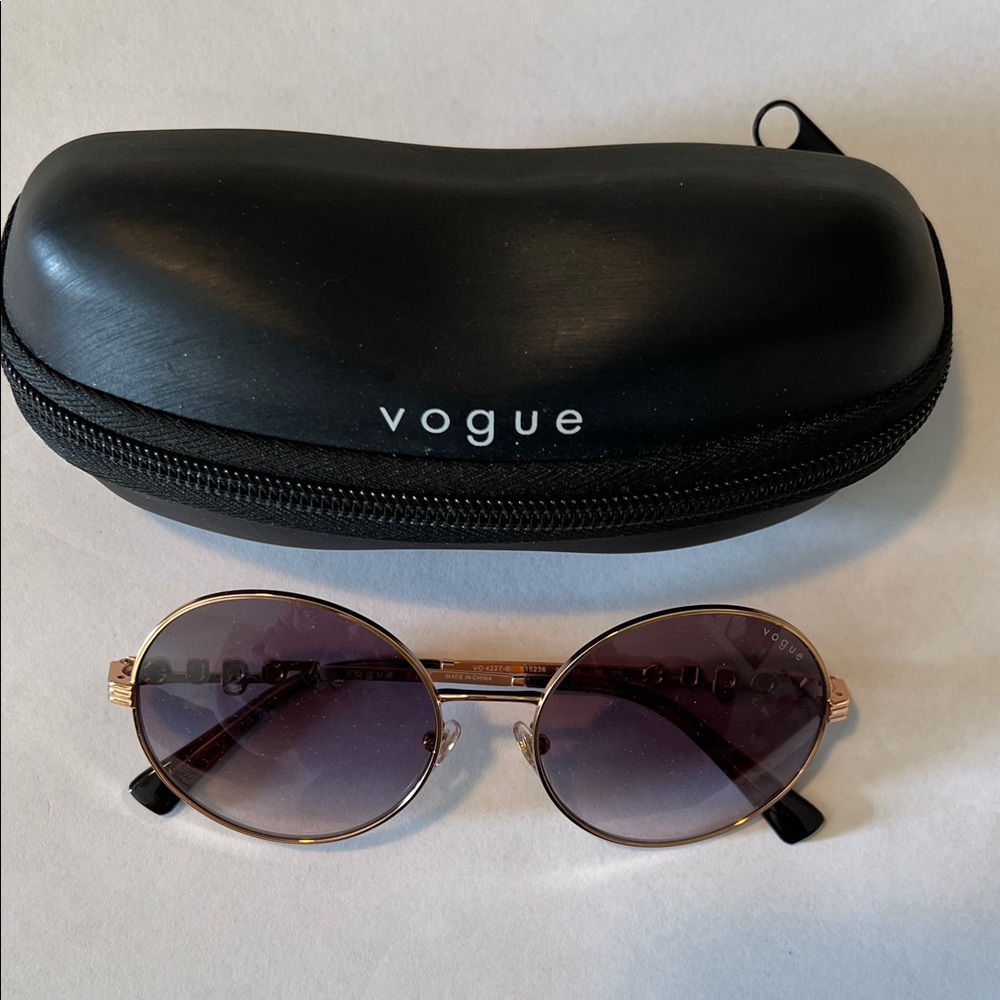 Vogue Sunglasses gold frames and tinted lenses